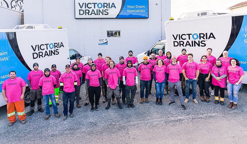 Staff of Victoria Drains wearing pink on Pink Shirt Day