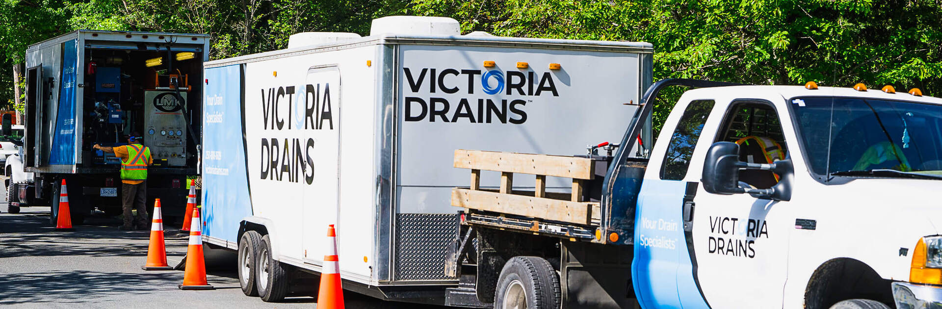 Victoria Drains truck parked on side of road in residential neighbourhood
