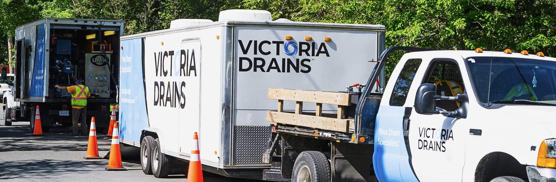 Victoria Drains truck parked on side of road in residential neighbourhood