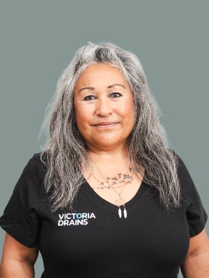 photo of woman in victoria drains shirt