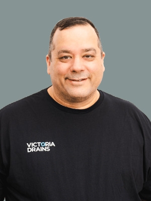 photo of man in victoria drains shirt